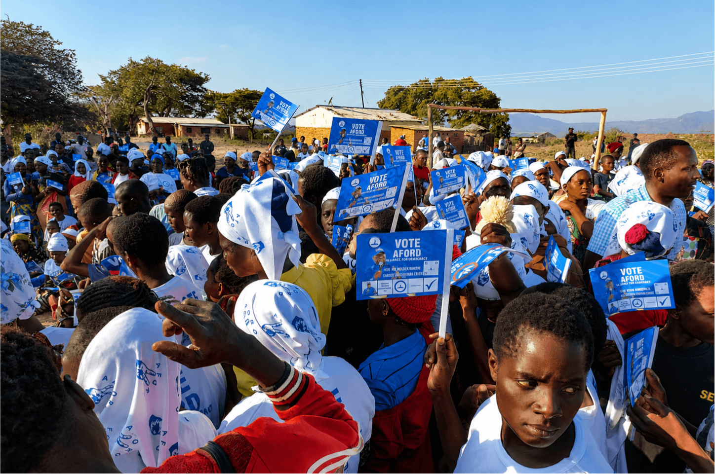 AFORD supporters standing together at a community gathering in Malawi